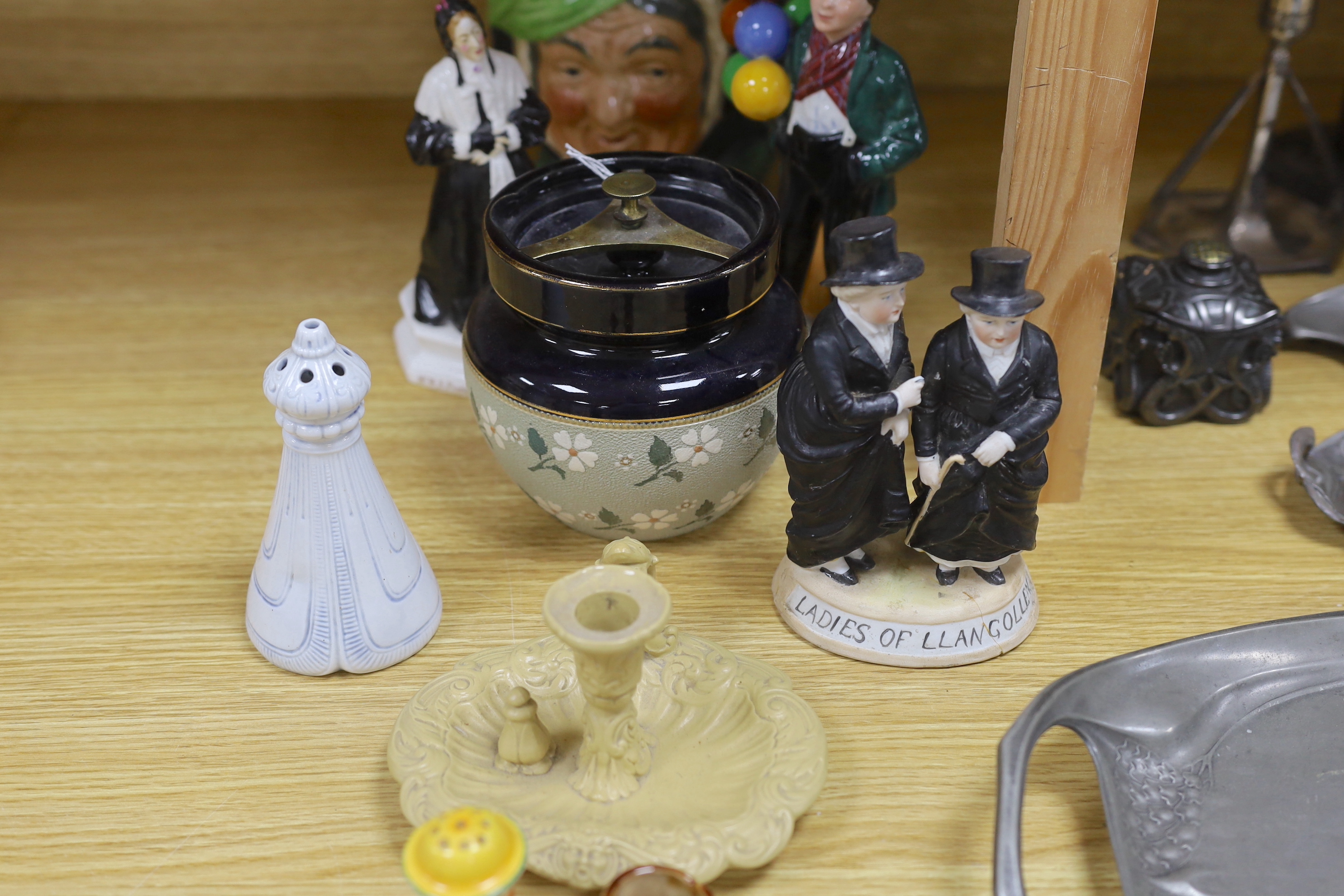 A Royal Doulton mug, two figures and a jar, a Clarice Cliff pepper and four other items (9), tallest Ballon Boy 20cm high
